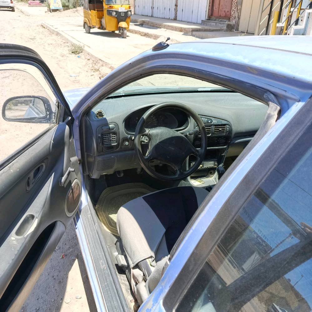 سياره مسيبوبوشي ميراج 1994 تك باب كير عادي كير محرك مكفولات غرفته نضيفه الكشر شوفة عين رقمه ديالى مكاني بغداد سبع البور***********
