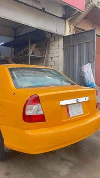 هونداي فيرنا 2014رقم بغداد حادثة تكمة وربع القمارة مصبوغة جديد السيارة...