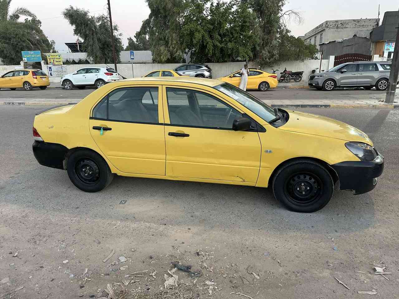 سلام عليكم لانسر موديل 2010اسمي بيه بنيد مبدل وبيه بارد بل جاملقات الخلفيه فقط صدر خلفي امامي كير محرك خير من الله تبريد ثلج السعر ٦٢وبيه مجال /***********
