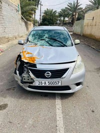للبيع نيسان فيرسا موديل 2013رقم نجف انكليزي ارقام وسنويه وهزه جدد تحوي...