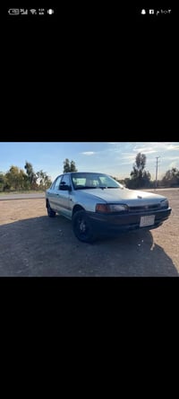 سياره مازده حجم 323 موديل 1993  سياره بلاديه مابيه لا ضربه ولا صبغ صدر...