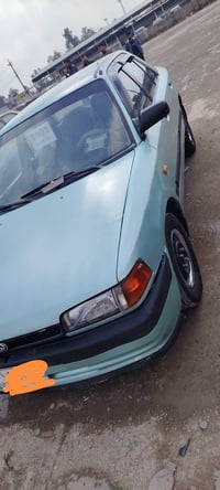 مازده ٣٢٣ • ١٩٩١ • مصبوغه جماليه