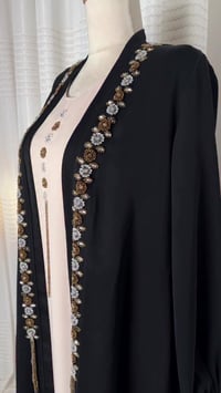 براند كويتي • ملابس