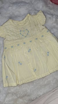 ملابس بيبي • ٦-١٢ شهر