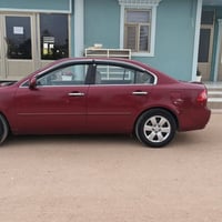 اوبتيما ٢٠٠٧ • ماشي ٩٤٠٠٠ • حادث خلفي