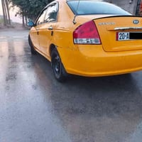 سبكترا موديل 2009باسمي رقم ديالى انكليزي  هزة جديدة سيارة جاهزة من كل ...