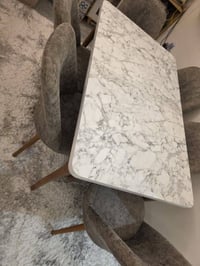 ميز طعام • أيادي العدل • محكمة الكرخ