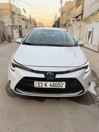 للبيع كورلاموديل24هايبرد وارد امريكي ابيض صدفي السياره حادثه جاملغات ب...