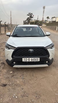 اخواني الكرام كورلا كروز موديل ٢٤ رقم بغداد مكفوله ماشيه ٤٠  كم باسمي ...