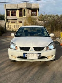 لانسر • ٢٠١١ • مكينة ١٦٠٠