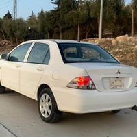 لانسر • ٢٠١١ • قير اوتوماتيك