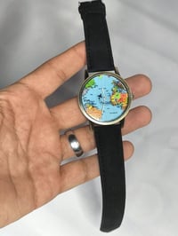 مكينة كوارتز • خريطة العالم • طيارة متحركة