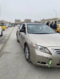 كامري ٢٠٠٧  وارد امريكي  مكينه  ٢٤٠٠  رقم دولي   صبغ حزام للجماليه فقط...