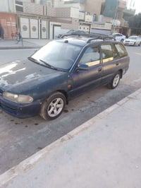 مستبوشي لانسر  موديل 93 كير توماتيك اصلي  محرك نضيف  كير نضيف  داخلها ...