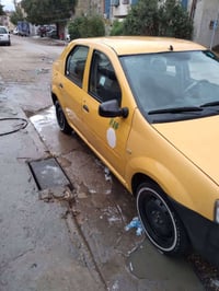 البيع سياره رينو لوكان ٢٠٠٩ اصفر رقم انكليزي سنويه سته وعشرين مصفره غر...