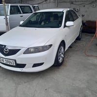 زووم 6 • ٢٠٠٣ • جير اوتوماتيك