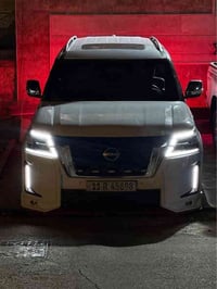 نيسان ارمادا ٢٠١٨ محدث ٢٠٢٤  مبوغة عام لون ال٢٤ ابيض ثلجي  السيارة بلا...