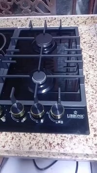 طباخ زجاج • ٤ عيون • غاز وكهرباء