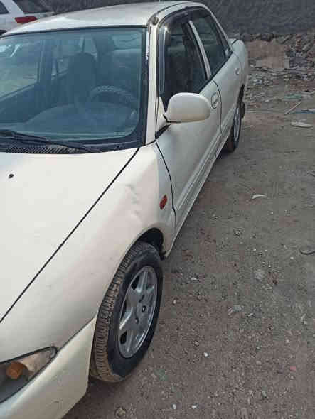 بروتون للبيع موديل 2004 بغداد ابيض محرك كير جيد حداديه جيده مابيه صبغ بس قبق الصندوك جزء بسيط السعر 48 وبيه مجال للتواصل*********** او 0787754920

