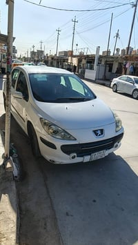 بيجو ٣٠٧ • ٢٠٠٦ • رقم بغداد