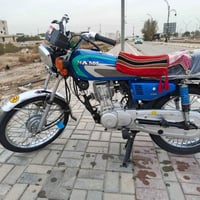 دراجة نارية • كفالة • كوت