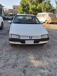 بيجو GLX 2009 مكينة ١٨٠٠ بدون صبغ مكينة و كير و صدر و تايرات جديدات مك...