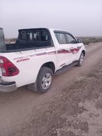هايلوكس فورويل ٢٠٢٣ماشيه 165الف  كير عادي بيهه شبر بارد 07829646096