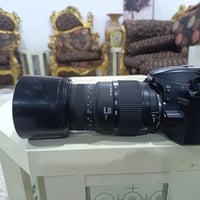 كامرة نيكون d3200 زوم 70-300 من ماركة سكماdg الكامرة ما واصلة للتصليح ...