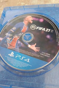 قرص2021  مستعمل والغلاف صورته تالفه PS4-Fifa