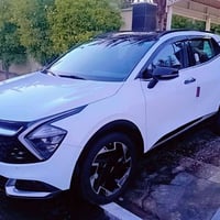 كيا سبورتج خليجي رقم بغداد بأسمي  للبيع موديل 2023  أبيض  فول مواصفات ...