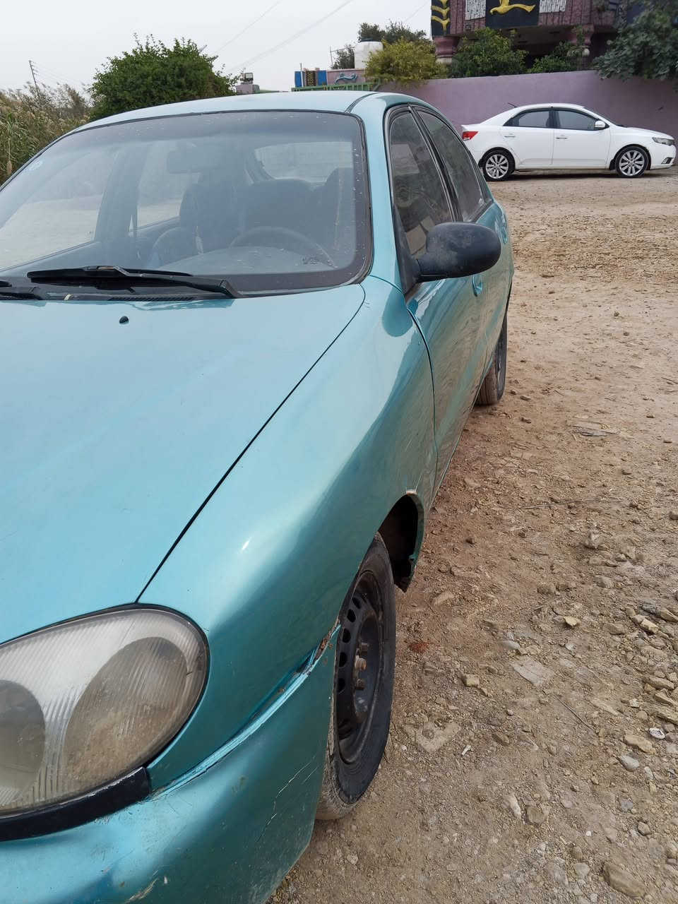 السلام عليكم دايو لالنس2002 للبيع سيارة بأسمي مكان بغداد قرب شقق بسماية السعر 26وبيها مجال ***********
