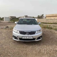 كيا اوبتما خطين محرك 2000 موديل 2009 رقم سليمانيا بيهه قطعتين جاملغ وب...