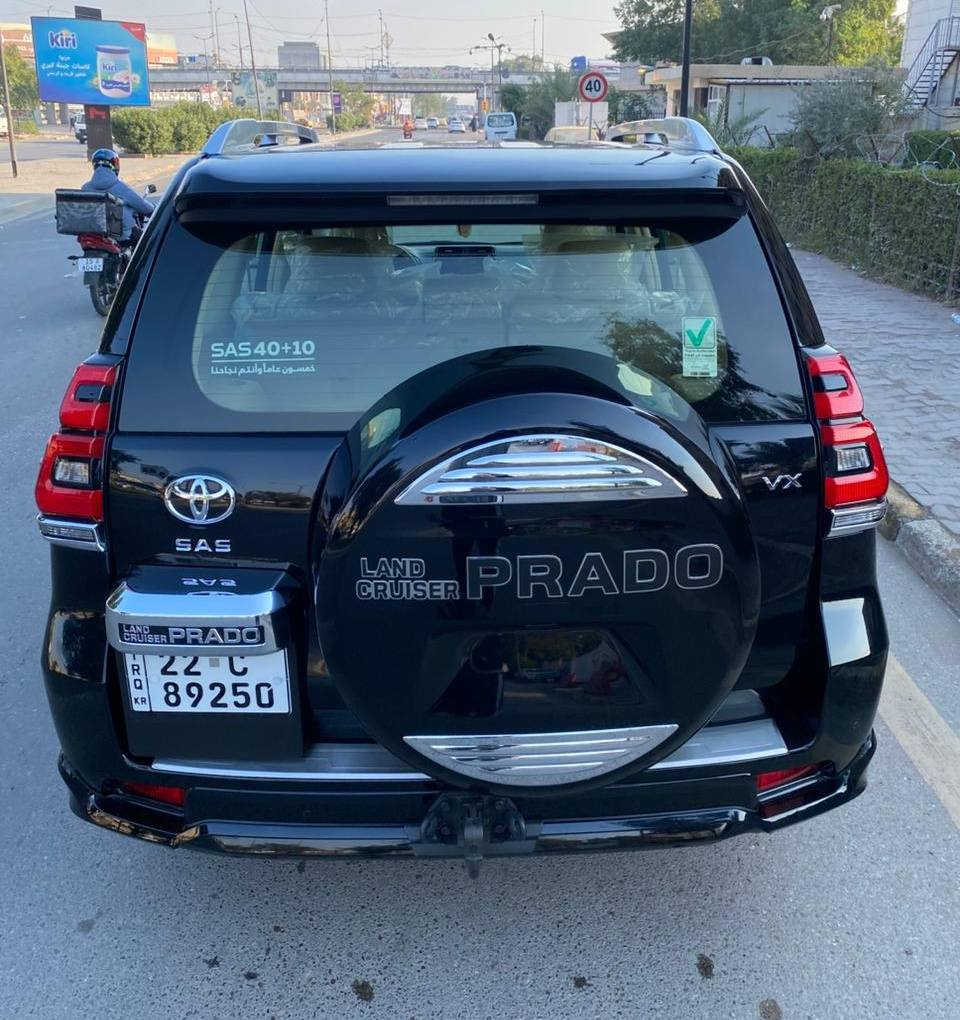 برادو 2023 مواصفات VX باب اول فول 1/1 
ضمان شركة ساز تويوتا العراق 
السيارة رقم اربيل باسم شركة ساز شرط التحويل سنوية نافذة 2028 
السيارة جديدة ماشية 33000كم حقيقي ومسجلة بالشركة وكل صيانتها بالشركة من الزيرو لحد الان ووين ميعجبك افحص
السيارة كفالة عامة من الصبغ والفتح والتبديل والبارد والحالوب وكير ومكينة وكلشي كفالة
فول مواصفات 1/1
بصمة وتشغيل عن بعد كراسي كهرباء وتبريد كشنات اربع كاميرات ستيرن كهرباء شفتات كير بالستيرن دبل ماوس  مري شفط دوسات ضوئية كراسي الخلفية كهرباء داخل صاج مراة وسطية عاكسة للضوء انارة داخلية محيطية حساس تاير وباقي المواصفات المعروفة
غراضها كاملة وياها كتلوكات ودفتر الضمان وعدة وطفاية وارضيات اصلية وبصمة ثانية 
مكان السيارة بغداد 

تليفون ***********
