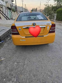 سياره سيكي الفين 13للبيع سياره اوراقه كامله بس شرعيه ابغداد اخذته من ش...