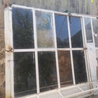 واجهة محل • باب حديد • للبيع