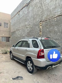 سبورتج 2009 خليجي  رقم بغداد مصبوغه حزام وبيها ضربه من ورا محرك وكير و...