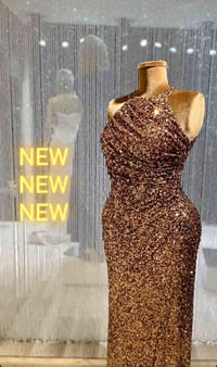 فستان • قياس ٣٦ • چاك من ورة