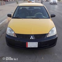 يا الله لانسر موديل 2010رقم بغداد تحويل ثاني يوم سياره بيه صبغ باب وجا...