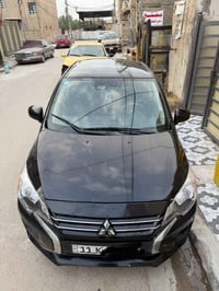 مسيوبيشي ميراج اسود   موديل 2024  السياره دخول جديد مرقم بغداد  وجاهز ...