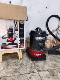 بغداد • حي العامل • مكنسة كهربائية