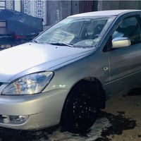 لانسر • ٢٠١١ • مكينة ٢٠٠٠