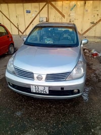 نيسان تيكو • علي رقم • خدام