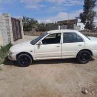 بروتون ٢٠٠٢ • شرط • دلي عباس