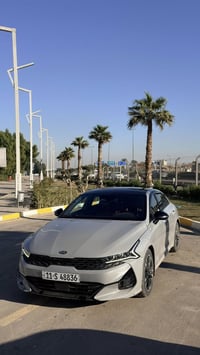 كيا k5 جيتي لاين لون اسمنتي  موديل ٢١  وارد امريكي حاليا ماشية 98 الف ...