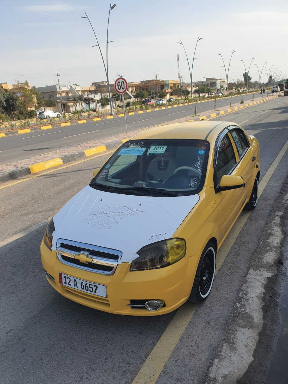 أفيو موديل 2011كوري 
محرك وكير شرط
هيئه وغرامه صفر 
شرعي موجود وشرط التحويل 
داخل لونين طخم جديد 
تايرات جديده
بيها دوائر خلفية معجون 
بدون دواخل
رقم نينوى إنكليزي
مكانها موصل حي سومر
سعرها ٦٣ وبيها مجال
***********
