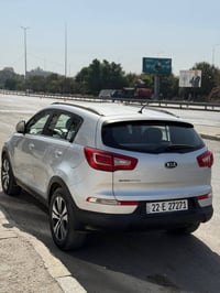 سبورتج 2012 كفالة عامة شرط  السيارة بدون قطرة صبغ بيها بس جراد بالقمار...