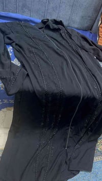 جديدة • ما ملبوسة