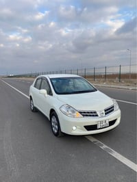 تيدا 2006 • قير عادي • بلا بوية