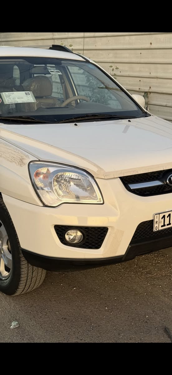 ‏سلام عليكم كيا سبورتنج ‏موديل 2010 ￼للبيع سيارة زيرو ماشي 51 رقم بغداد الدولي مكان السيارة بغداد  الهاتف***********￼
