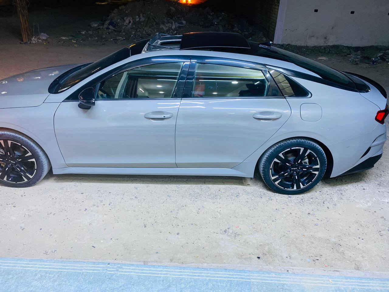 السلام عليكم
للبيع كي 5 امريكي موديل 2023 ماشية 29 الف اخت الزيرو رقم بغداد بأسمي  فووووول مواصفات اعلى مواصفات بالامريكي GTLine
المواصفات
1- محرك 1600 تيربو 
2- خمس كامرات
3- السقف بانو راما
4- بصمت تشغيل وبيبان وجنطه
5- كشنات جلد لون احمر 
6- كشنات حار بارد
7- الكشنات الاماميه السايق خزن ميموري كهرباء والراكب كهرباء
8- شاحن واير ليس
9- جنطه كهرباء وتفتح عنده القتراب 
10- رادار 360 درجه
11- حساس عدد 6 امامي و 6حساس خلفي
12- زنون عالي ناصي
13- شاشة اعطال 
14- شاشة كبيره
15- الأشاير يمين ويسار كامرات بالدشبول
16- نضام السماعات BOSE دمام
17- 5 ويل كب كروم حجم 18 
18- اناره محيطيه متغيره اللوان داخل السياره
19- هند بريك بصمه
20- بريك اوتو هولد
21- 5 انظمة قياده
22- تبريد منفصل السايق عن الراكب
23- تبريد لمس نظام اوتو
24- تشغيل عن بعد
25- تبريد قطعتين امامي خلفي
26- شفتات استيرن رياضي
27- رادار امامي وقوف ذاتي 
28- تحديد مسار 
29- دشبول داته شوه
السيارة اعلى مواصفات 
اي استفسار هذا رقمي ***********
مكان السيارة بغداد الكمالية
